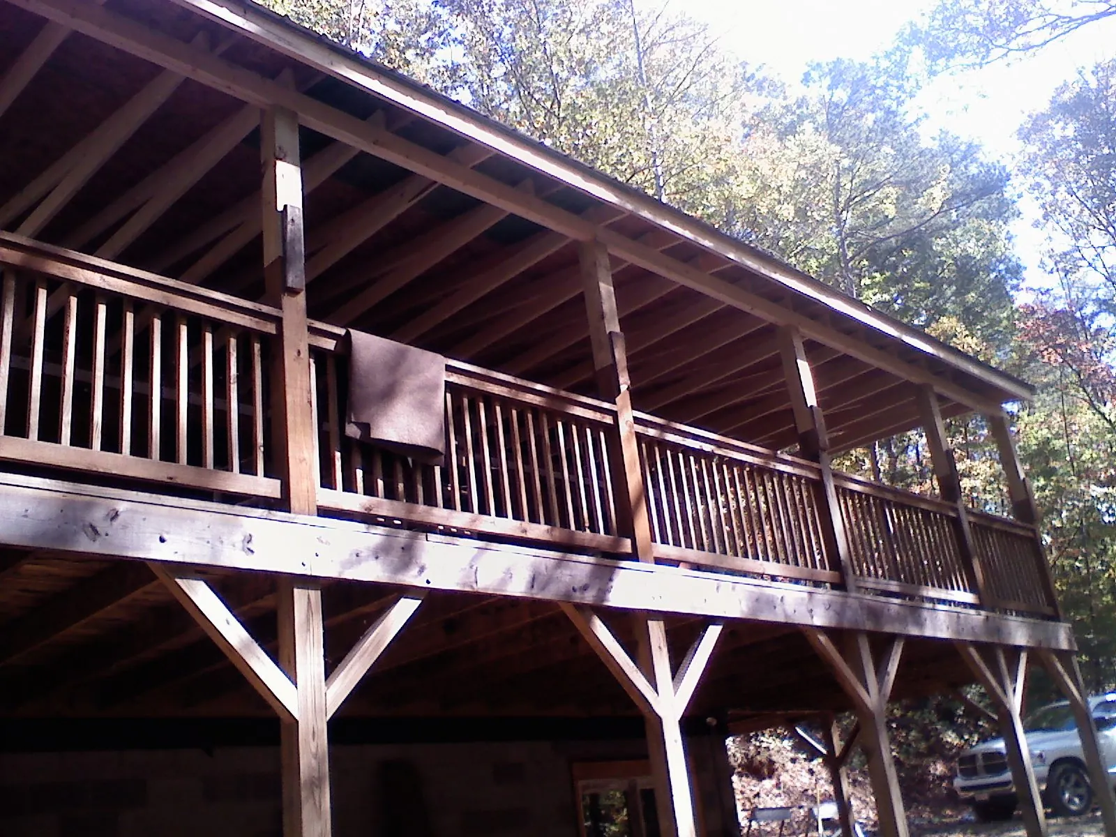 Timber framing under a new elevated porch and deck — Roof Leak Repair in Orangeville by Roofing Brothers